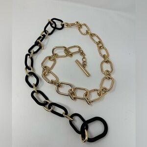 Neat heavy duty gold and black Hook belt chain .